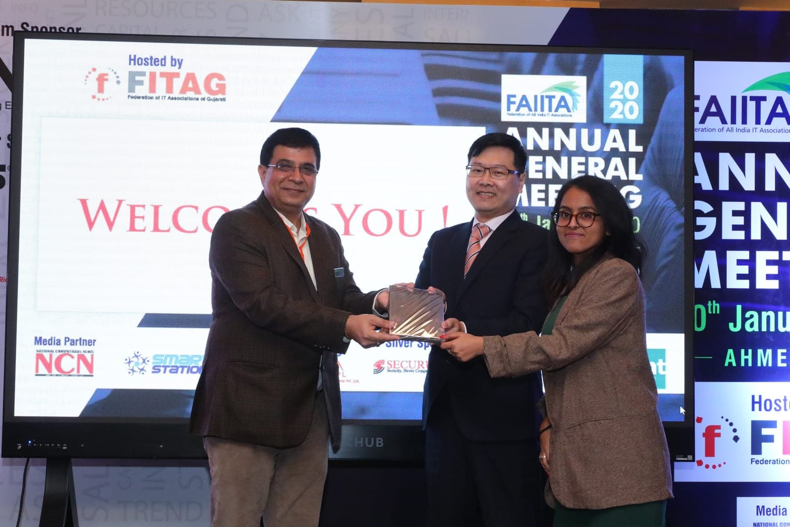 FAIITA leadership presents a memento to a guest at the AGM 2020