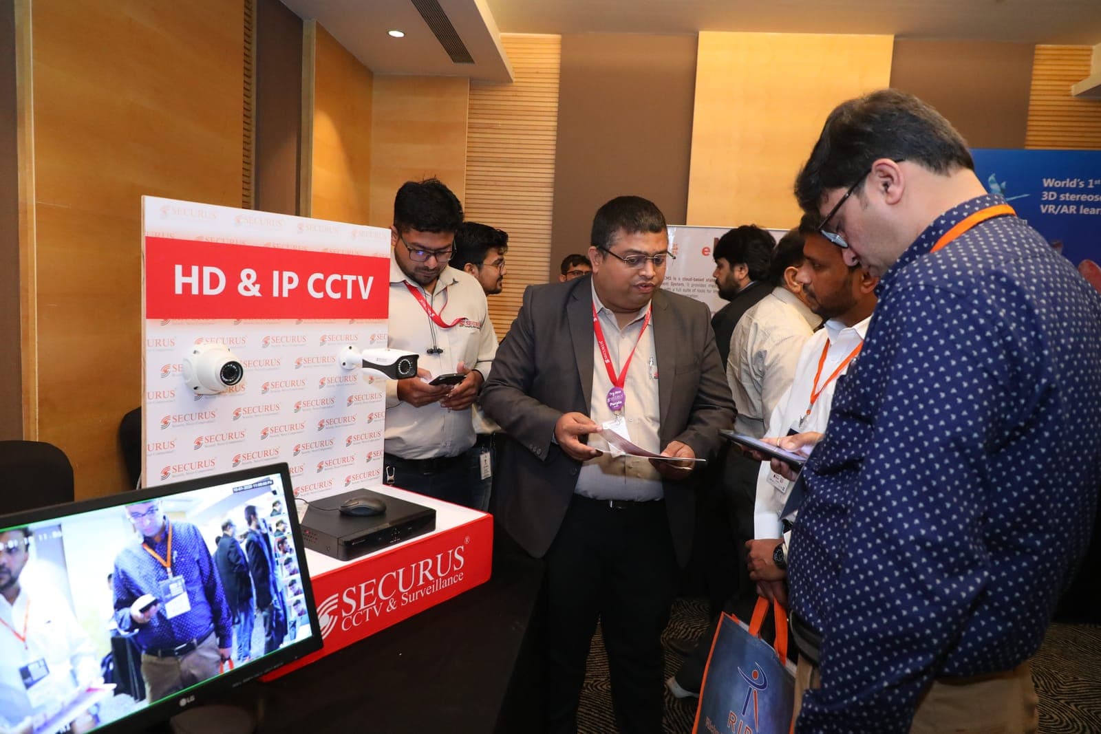 Delegates review HD & IP CCTV solutions at an exhibitor stall during the FAIITA AGM 2020