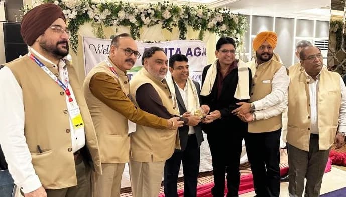 FAIITA leaders present a memento to a distinguished guest/member.