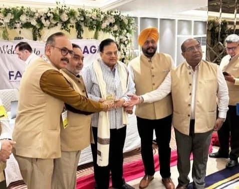 Felicitation of a senior member with a memento during the FAIITA AGM 2025.