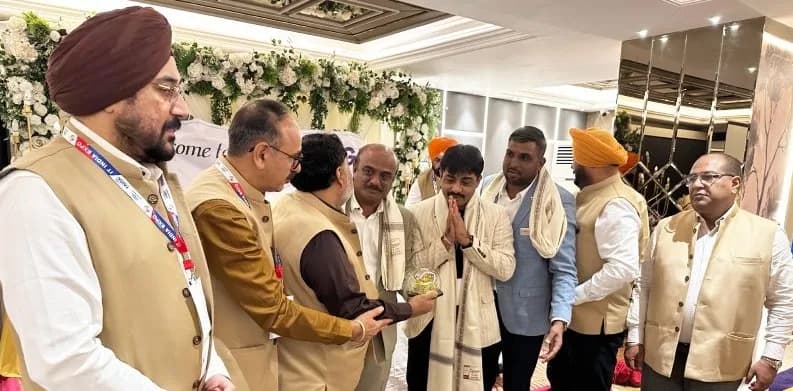 A member is felicitated by the FAIITA leadership during the AGM.